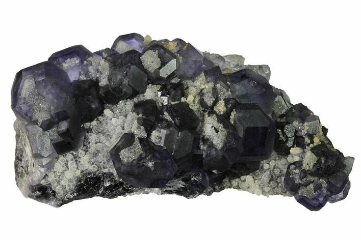 Purple Cuboctahedral Fluorite Crystals on Quartz - China #163576